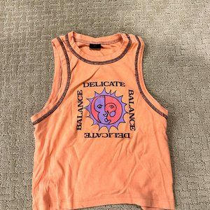 UO Graphic Orange Cropped Tank Top